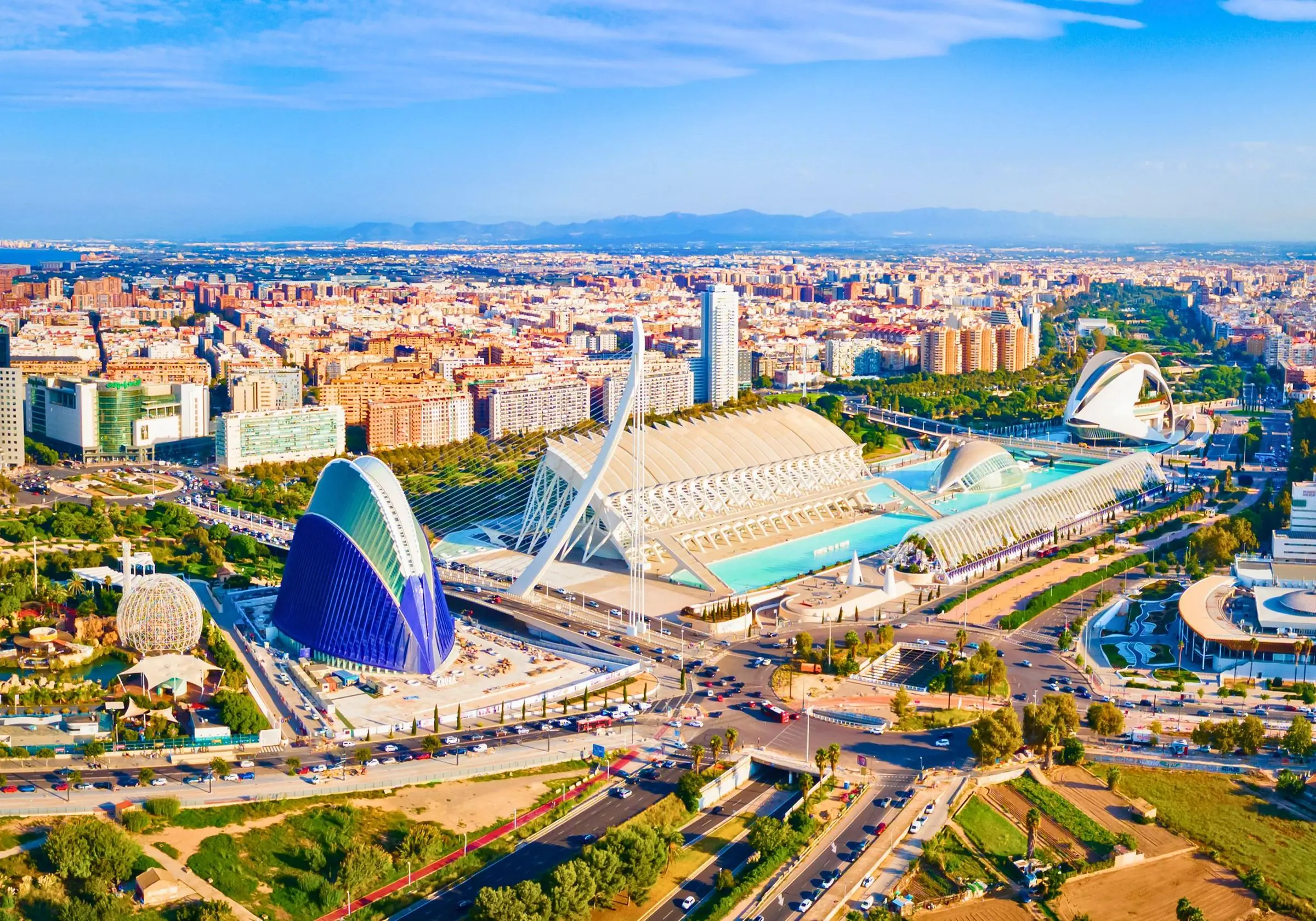 The futuristic white architecture and reflection pools of the City of Arts and Sciences in Valencia